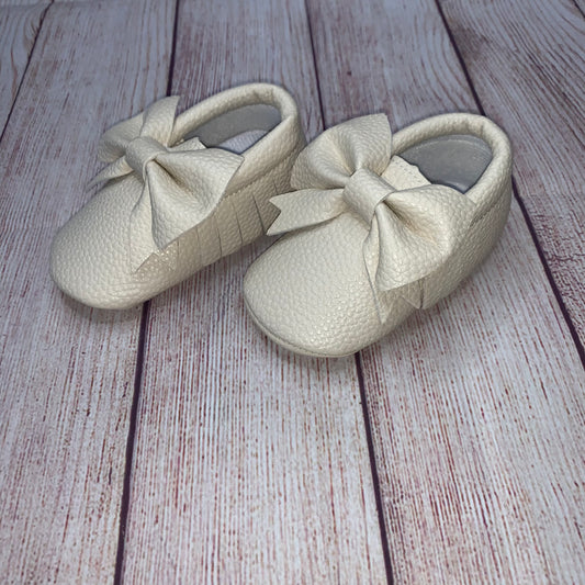 Cream Fringe Moccasins