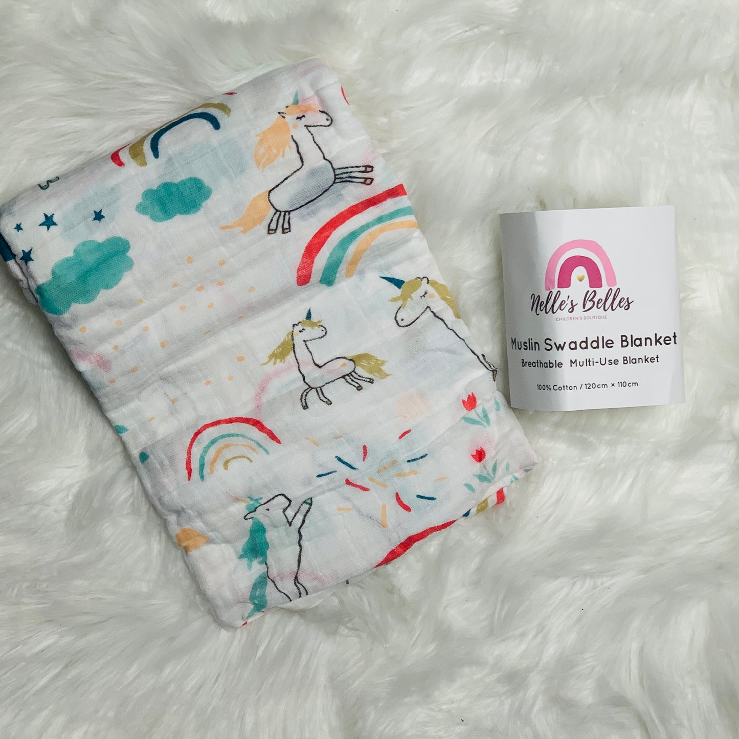 Unicorns and rainbows muslin swaddle blanket